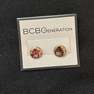SOLD BCBGeneration gold emoji earrings